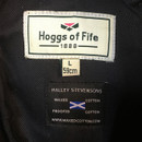 Interior label of the hat showing Hoggs of Fife 1888 branding and waxed cotton fabric information.
