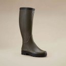 Three-quarter view of a Le Chameau women’s Giverny green wellington boot with signature branding and chunky black sole.