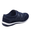The back of a navy blue casual slip-on shoe with white stitching and a zip fastening, featuring a white and navy sole.