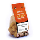 A clear bag containing 2kg of second early Saxon Scottish seed potatoes with an orange label by Jamieson Brothers, conveying freshness and quality.