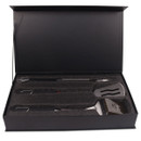Three-piece barbecue tool set presented in a black foam-lined gift box.