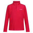 Pink long-sleeve fleece jacket with a quarter-zip and a small white logo on the chest. The material appears soft and warm, conveying a cosy feel.