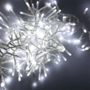 Close-up of cool white LED cluster Christmas lights on a clear cable, showing densely packed bulbs creating a bright, sparkling festive display for indoor and outdoor use.
