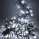 White LED cluster Christmas lights arranged in a decorative bundle, featuring densely packed cool white LEDs on a green cable for bright indoor and outdoor festive illumination.