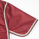 A close up view of the rug's tail flap.