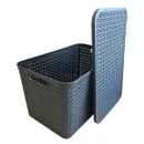 Dark grey woven plastic storage basket with removable lid shown open, rectangular design with textured pattern and cut-out handles, practical organiser for household storage and decluttering.