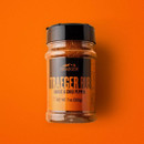 Traeger Rub garlic and chilli pepper seasoning jar on orange background