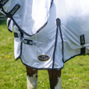 Horse wearing a white Gallop fly rug with straps standing in a field.