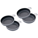 Four sleek, non-stick pans with silver handles stacked neatly.