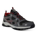 Angled close-up of grey and black walking trainer with red detailing and rugged grip outsole.