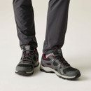 Front view of grey and red waterproof trail shoes with lace fastening and reinforced toe caps.