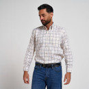 Man modelling a white long-sleeve checked shirt with blue and green grid pattern, paired with blue jeans and a black belt.