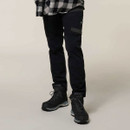 Angled studio view of black Hard Yakka trousers with slim fit leg, utility pocket and work boots