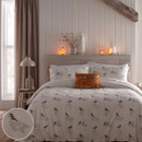 View of a natural Dreams & Drapes Lodge Chickadees Bedding Set on a bed