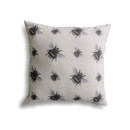 A cream outdoor scatter cushion with a bee print on a white background