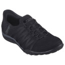 A sleek, black athletic shoe with a low profile design, featuring textured mesh and elastic lacing for a snug fit, exuding comfort and style.