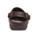 Back view of a single brown clog sandal with a textured sole and adjustable heel strap featuring the brand name. The image conveys comfort and functionality. Back view of a single brown clog sandal with a textured sole and adjustable heel strap featuring the brand name. The image conveys comfort and functionality.