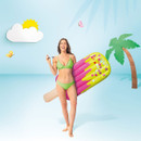 Person holding a pink inflatable popsicle pool float against a playful illustrated summer background.