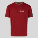 Red t-shirt with "RLNZ" logo on the chest and a small tag on the sleeve.