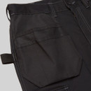 Detailed view of heavy-duty utility pocket on black CAT trousers with reinforced seams for durability