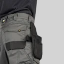 Side detail of grey CAT trousers with holster pocket, tool loops and reinforced fabric construction