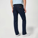 Rear view of dark blue straight-leg jeans showing back pockets and waistband patch.
