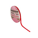 A spool of red velvet ribbon against a white background.