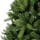 Close-up of a premium artificial Christmas tree featuring realistic mixed-tip green branches for a full, natural evergreen appearance.