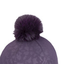 A purple hat silk with a fluffy pom-pom on top against a white background.