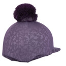 Rear of purple hat silk with a subtle camo pattern and a pom-pom on top facing slightly to the right.