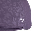 Close-up of a purple hat silk fabric with a small black Aubrion logo.