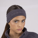 Woman wearing a dark grey headband and fleece jacket.