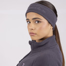 Person wearing a dark grey headband and fleece jacket, viewed from the side.