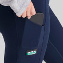 A close-up view of a pocket on a navy pair of Ridgeline women's infinity leggings.