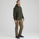 Full body view of a man wearing a forest green Ridgeline ballistic hoodie paired with cargo trousers.