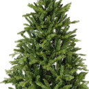 Detailed view of the upper section of an artificial Christmas tree, showcasing lush green branch tips and natural-looking evergreen foliage.