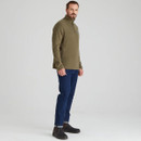 Men’s ivy green Ridgeline half-zip fleece styled with dark jeans and outdoor boots, highlighting the relaxed fit and lightweight warmth.