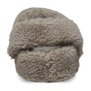 Fuzzy beige slipper with soft, fluffy texture and an open back. It looks warm and cosy, evoking a sense of comfort and relaxation.