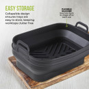 A collapsible black silicone tray with handles on a wooden board highlighting 'EASY STORAGE' and 'FLEXIBLE SILICONE'.