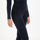 A woman wearing Navy Breeches on a grey background