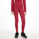 A person wearing a pair of ember red coloured breeches