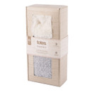 A boxed pair of knitted grey booties