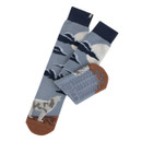 A pair of blue socks with wolves on.