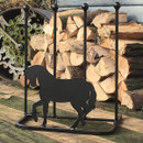Metal horse silhouette boot rack in front of a woodpile.