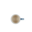 A light blue espresso mug from above.