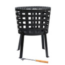 Black round metal fire basket with grill on top and poker tool beside it.
