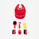 LeMieux toy pony red grooming bag, brushes, curry comb, sponge, tangle tidy and hoof pick against a white background.