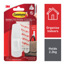 A package of a 3M Command brand large utility hook that holds up to 2.2 kg for organizing indoors.