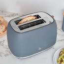 Top angled view of the Swan Fjord 2 slice toaster showing extra wide toasting slots with artisan bread and a polished stainless steel top plate.