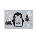 A bath mat featuring an adorable penguin with snowflakes and trees.